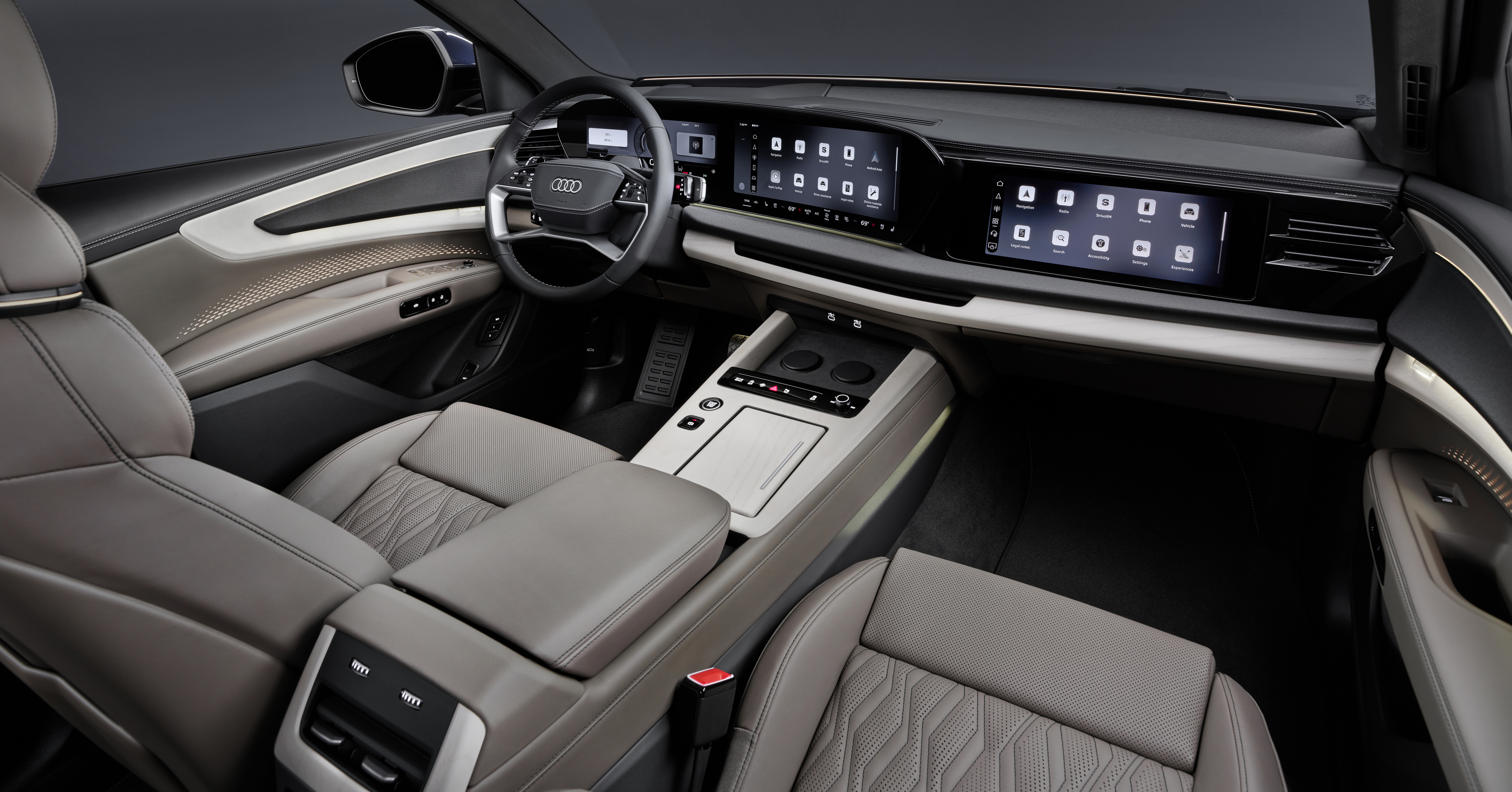 Mängder av digitala skärmar har integrerats i Audi Q9:s interiör, inklusive en skärm för passageraren.