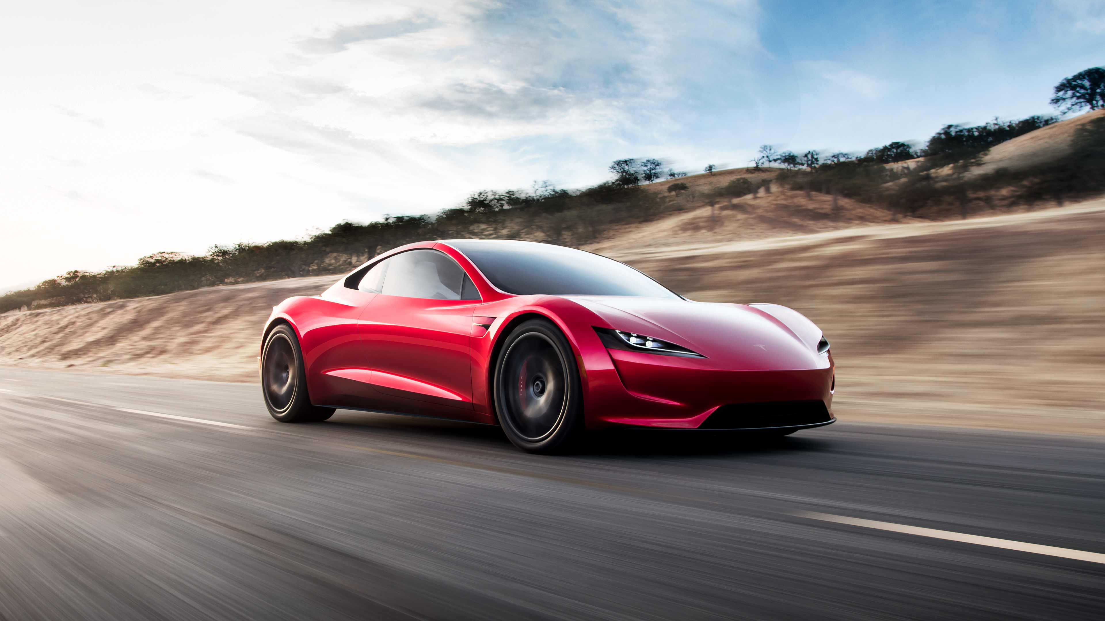 Den röda Tesla Roadster i sin nuvarande design, som nu kan vara nära en uppdaterad premiär med nya, extrema funktioner.